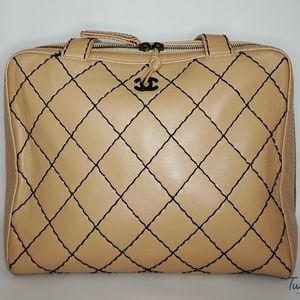 CHANEL camel with black stitch